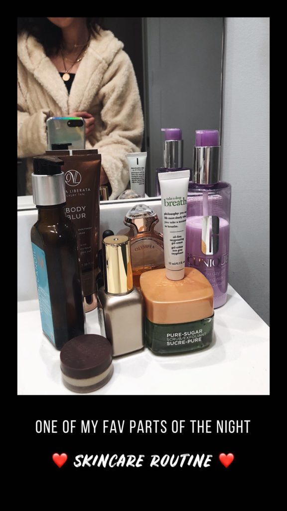 Skincare products on bathroom vanity for Night-Time Routine
